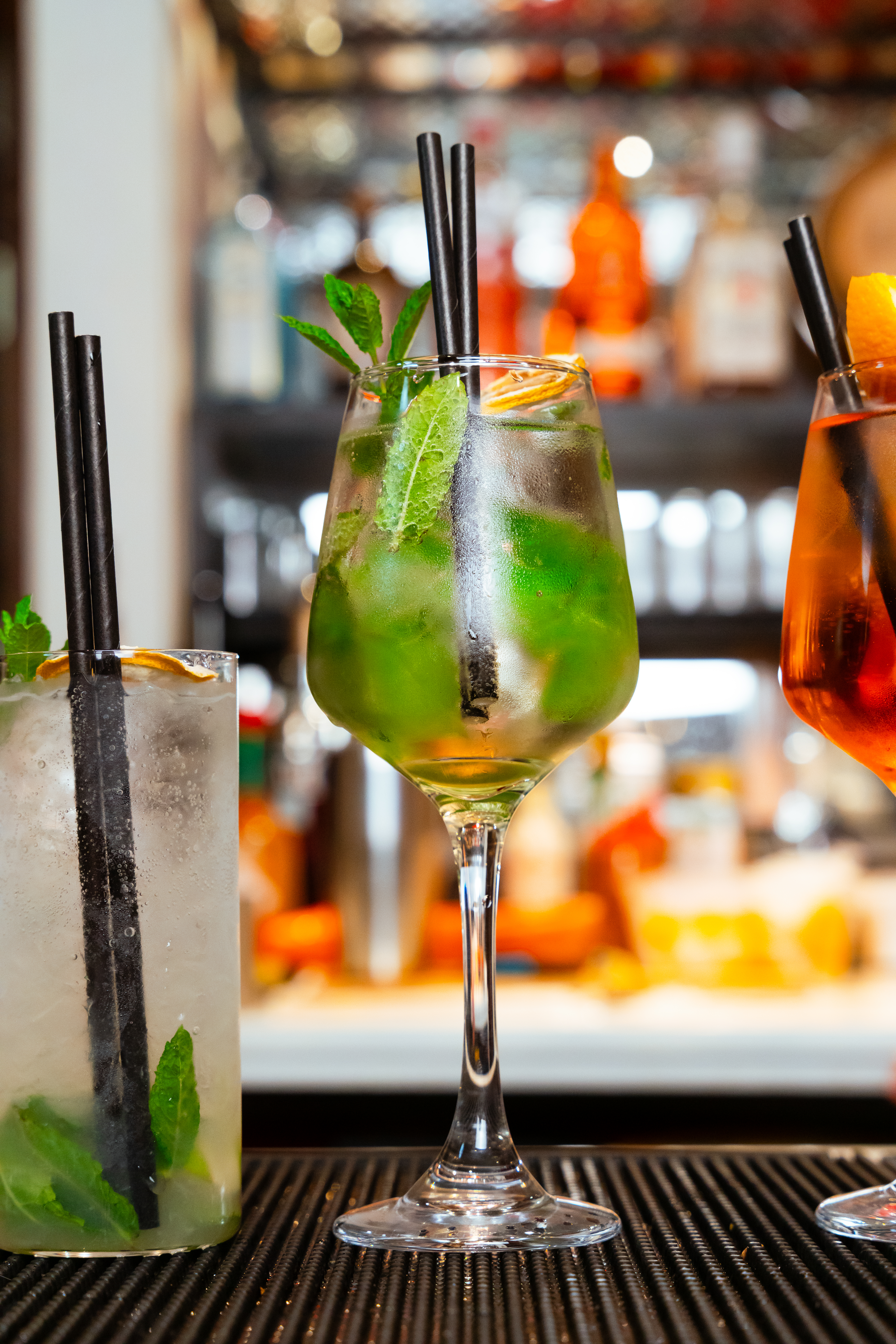 Green cocktail with mint at Mate's bar